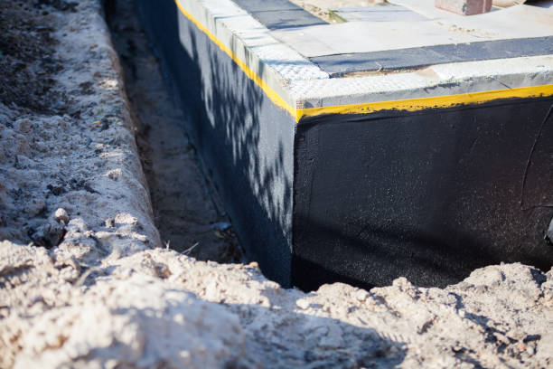 Professional Waterproofing technician working in Murray City, OH